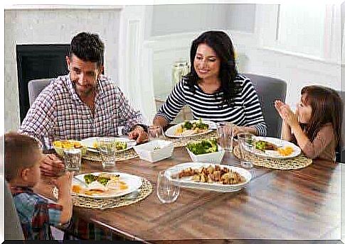 family at dining table