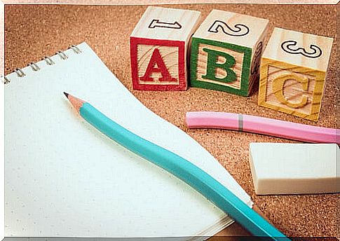 Letter blocks, pencils, erasers and pads