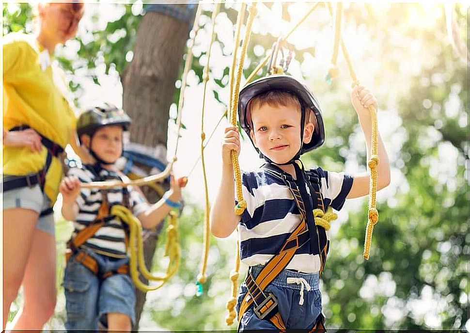 children ride zipline