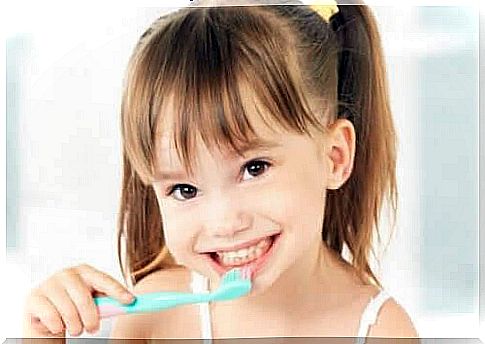 girl with toothbrush