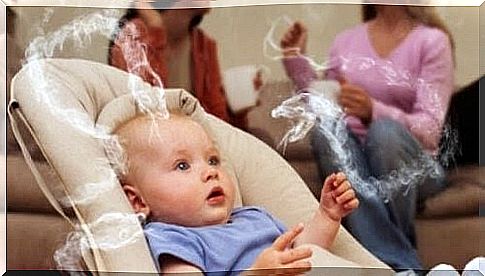 passive smoking: baby with smoke around him