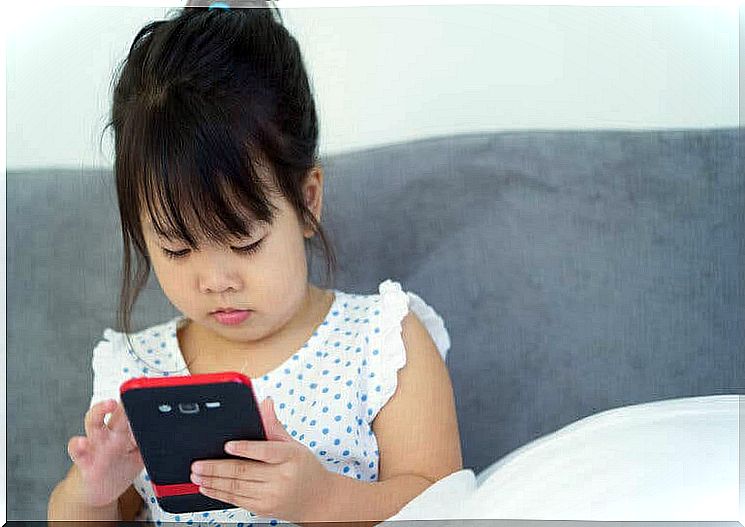 your phone is childproof: girl with mobile