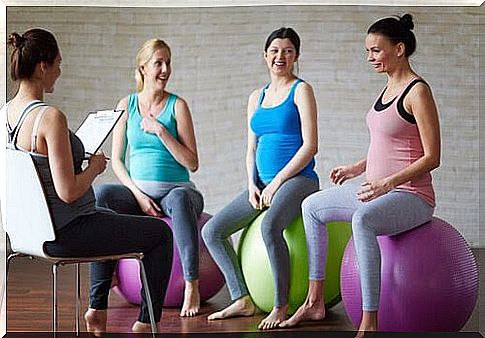 four pregnant women on pilates balls