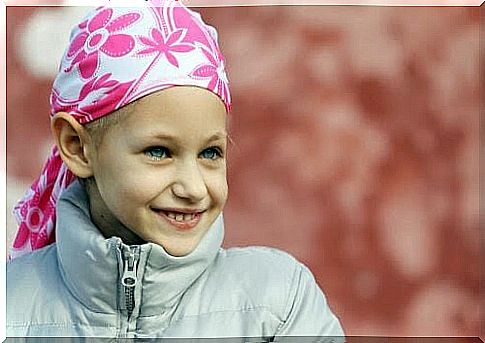 leukemia in children: girl with a shawl around her head