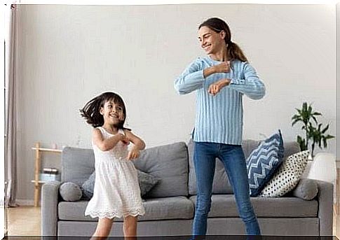 the role of the nanny: nanny and children dancing